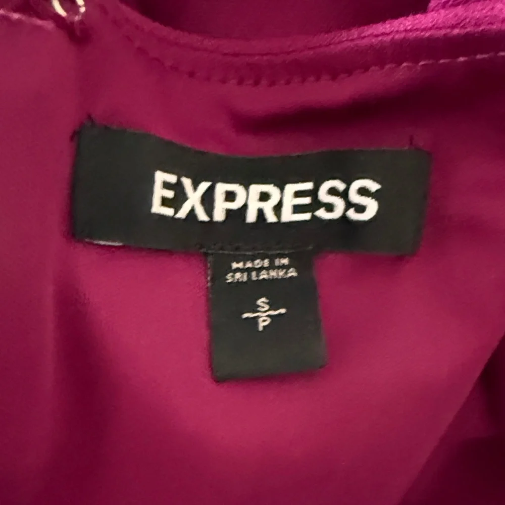 Elegant Express fuchsia Jumpsuit with cutouts at sides and pockets! - Picture 7 of 9